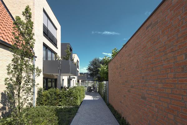 Begrünte Zuwegung zum Hauseingang Mehrfamilienhaus Stadtgärten Telgte